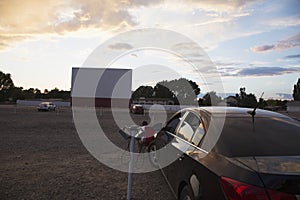 Empty movie screen at sunset, Star Drive In Movie Theater, Montrose, Colorado, USA photo