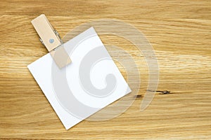 Empty note on wooden surface