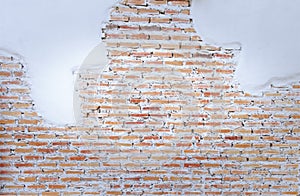 Empty old brick wall painted texture happy red-brown wall wide grunge brick wall shabby building with damaged plaster abstract web