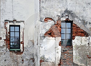 Empty old brick wall texture with windows
