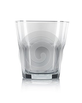 Empty old fashioned cocktail glass on a white background