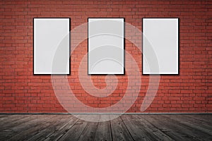 Empty old grungy room with red brick wall and wooden floor