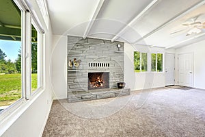 Empty old house interior with fireplace