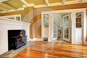 Empty old living room with an antique stove