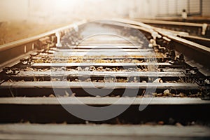 Empty old railway rails with wooden sleepers. The road for the train. Journey