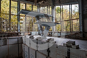 Empty old swimming pool at the gym in the abandoned school building located in the Chernobyl ghost town