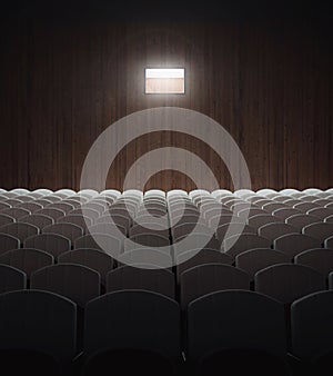 Empty old theater with rows of seats and projector light.3d rendering