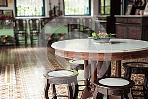 empty old and vintage table and chair decoration in a room