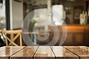 Empty old wood table top with bokeh coffee shop interior background, 3D Rendering