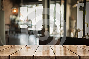 Empty old wood table top with bokeh coffee shop interior background, 3D Rendering