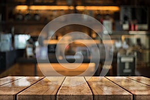 Empty old wood table top with bokeh coffee shop interior background, 3D Rendering