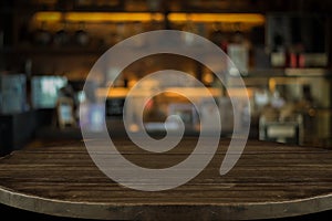 Empty old wood table top with bokeh coffee shop interior background, 3D Rendering