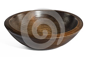 Empty old wooden bowl on wooden table