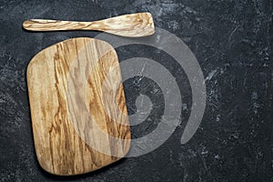Empty olive wood cutting board