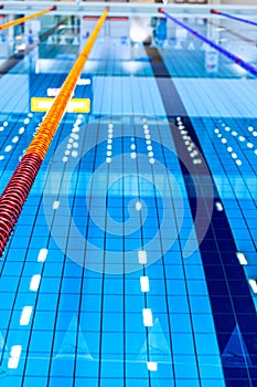 Empty Olympic swimming pool