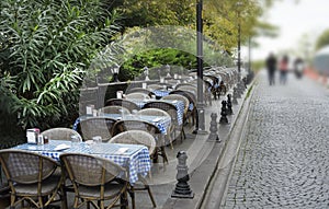 Empty open air restaurant on the sidewalk in Istanbul.