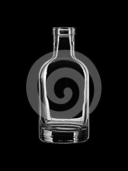 Empty open bottle for alcoholic beverages, isolated on black background