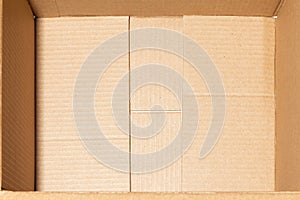 Empty open brown cardboard box