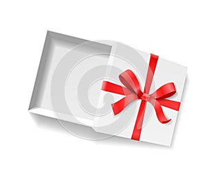 Empty open gift box with red color bow knot and ribbon isolated on white background.