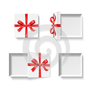 Empty open gift box with red color bow knot and ribbon isolated on white background.