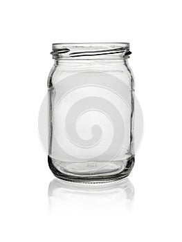 Empty, open jar of clear, colorless glass. Isolated on a white background with reflection