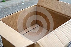 Empty open rectangular cardboard box close up