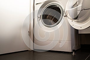 Empty open washing machine. Drying and airing the washer machine after launder clothes.