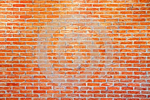 Empty orange brick wall background texture.