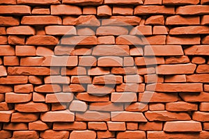 Empty orange brick wall background texture.