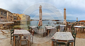 Empty outdoor cafe in the morning, Chania, Crete