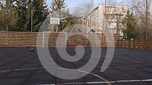Empty outdoor mini football and basketball court