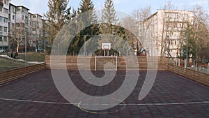 Empty outdoor mini football and basketball court