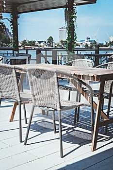 empty outdoor patio table and chair in restaurant