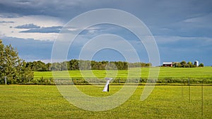 Empty outdoor wedding set up in the middle of Saskatchewan praire