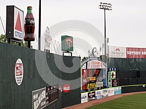 Empty outfield with ads on wall
