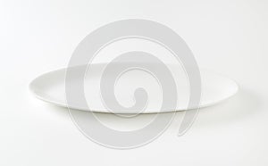 Empty oval white plate