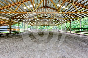 Empty paddock with shelter in the horse farm