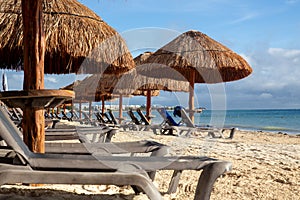 Empty Palapa Beach Chairs