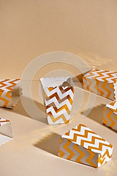 Empty paper golden Christmas cups for winter holidays meetings with friends with New Year