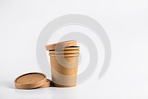 Empty paper soup cup on a white background. Brown food container for ice cream, noodles or other dishes. ecological product that