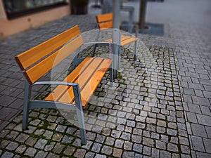 Empty park banches and seats in November.