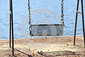 Empty park swing in the daytime