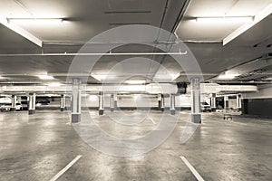 Empty parking garage underground interior in apartment or in su