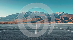 Empty Parking Lot With Mountains in Background