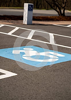 An empty parking lot showing handicap parking spaces