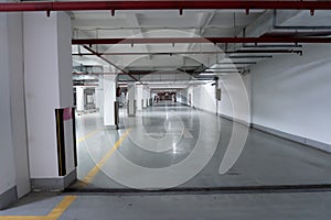 Empty Parking underground garage interior with blank billboard