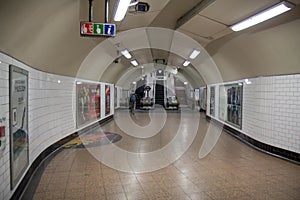 Empty passage deep in the London Underground.