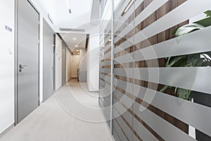 Empty passageway in business office photo