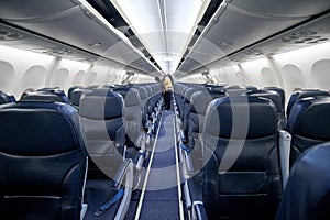 Empty passenger airplane seats in the cabin of plane