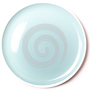Empty pastel blue plate on white background